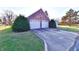 Two-car brick garage with a large driveway at 1500 S Anderson St, Elwood, IN 46036