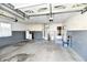 Attached garage with storage and utility area at 1500 S Anderson St, Elwood, IN 46036