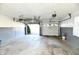 Spacious garage with overhead door and storage at 1500 S Anderson St, Elwood, IN 46036