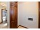 Laundry room with built-in wooden cabinets and hookups at 1500 S Anderson St, Elwood, IN 46036