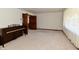 Living room with neutral carpeting and access to other rooms at 1500 S Anderson St, Elwood, IN 46036