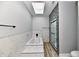 Modern bathroom with soaking tub, glass shower, and stylish tile at 2318 E Brookside Ave, Indianapolis, IN 46218