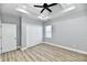 Spacious bedroom with double-door closet and ceiling fan at 2318 E Brookside Ave, Indianapolis, IN 46218
