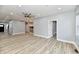Spacious living area with hardwood floors and an open floor plan at 2318 E Brookside Ave, Indianapolis, IN 46218