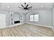 Spacious main bedroom with vaulted ceiling, hardwood floors and fireplace at 2318 E Brookside Ave, Indianapolis, IN 46218