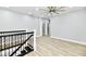 Upper level with hardwood floors and a view of the lower level at 2318 E Brookside Ave, Indianapolis, IN 46218
