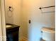 Simple bathroom with vanity and toilet at 3206 W 57Th St, Indianapolis, IN 46228