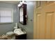 Bathroom includes a vanity, toilet, and shower at 3206 W 57Th St, Indianapolis, IN 46228