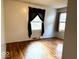 Spacious bedroom featuring hardwood floors and large windows at 3206 W 57Th St, Indianapolis, IN 46228