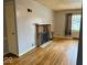 Living room features hardwood floors, fireplace and lots of natural light at 3206 W 57Th St, Indianapolis, IN 46228