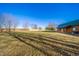 Spacious backyard with grassy lawn and mature trees at 4298 W 300 N, Anderson, IN 46011