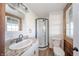 Updated bathroom with a walk-in shower and granite vanity at 4298 W 300 N, Anderson, IN 46011