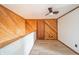 Loft bedroom with wood walls and ceiling fan at 4298 W 300 N, Anderson, IN 46011