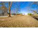 Log cabin home nestled on a spacious lot with mature trees at 4298 W 300 N, Anderson, IN 46011