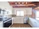 Modern kitchen with granite countertops and stainless steel appliances at 4298 W 300 N, Anderson, IN 46011