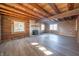 Spacious living room with wood floors and exposed beams at 4298 W 300 N, Anderson, IN 46011