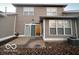 Small back patio with sliding glass doors leading to the interior at 581 Beehler Dr, Whiteland, IN 46184