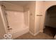 Bathroom with tub, shower, and access to closet at 581 Beehler Dr, Whiteland, IN 46184