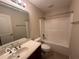 Clean bathroom with tub, toilet and vanity at 581 Beehler Dr, Whiteland, IN 46184