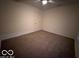 Bright bedroom with carpet and ceiling fan at 581 Beehler Dr, Whiteland, IN 46184