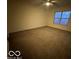 Bright bedroom with neutral carpeting and ceiling fan at 581 Beehler Dr, Whiteland, IN 46184
