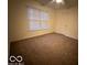 Spacious bedroom with carpet and ceiling fan at 581 Beehler Dr, Whiteland, IN 46184