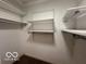 Walk-in closet with hanging rods and shelves at 581 Beehler Dr, Whiteland, IN 46184