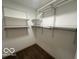 Large walk-in closet with ample shelving at 581 Beehler Dr, Whiteland, IN 46184