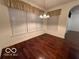 Bright dining room with hardwood floors and window seating at 581 Beehler Dr, Whiteland, IN 46184