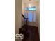 Bright entryway with hardwood floors, staircase, and a chandelier at 581 Beehler Dr, Whiteland, IN 46184