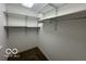 Large walk-in closet with shelving and hanging rods at 581 Beehler Dr, Whiteland, IN 46184