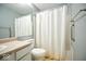 Clean bathroom with shower and grab bars at 8231 Golden Ridge Ln, Indianapolis, IN 46237