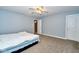 Spacious bedroom with carpet and ceiling fan at 8231 Golden Ridge Ln, Indianapolis, IN 46237