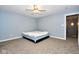 Bedroom with a bed and ceiling fan at 8231 Golden Ridge Ln, Indianapolis, IN 46237