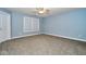 Bright bedroom with carpet and ceiling fan at 8231 Golden Ridge Ln, Indianapolis, IN 46237