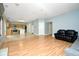 Open concept kitchen with island and hardwood floors at 8231 Golden Ridge Ln, Indianapolis, IN 46237