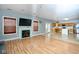 Open concept kitchen and living area with hardwood floors at 8231 Golden Ridge Ln, Indianapolis, IN 46237