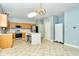 Spacious kitchen with an island, stainless steel appliances, and light wood cabinets at 8231 Golden Ridge Ln, Indianapolis, IN 46237