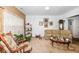 Living room with neutral colored couch and rocking chair at 11554 Brook Bay Ln, Indianapolis, IN 46229