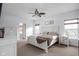 Main bedroom with a white bed frame and a leopard print blanket at 165 Warrington Dr, Pittsboro, IN 46167