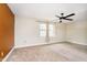 Bedroom with ceiling fan, neutral walls, and large window at 1850 White Oak W Ln, Martinsville, IN 46151
