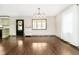 Dining area with hardwood floors and a view to the kitchen at 1850 White Oak W Ln, Martinsville, IN 46151