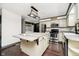 Kitchen boasts an island, stainless steel appliances, and hardwood floors at 1850 White Oak W Ln, Martinsville, IN 46151