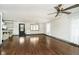Living room with hardwood floors, shiplap, and French doors at 1850 White Oak W Ln, Martinsville, IN 46151