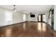 Spacious living room with hardwood floors and white shiplap wall at 1850 White Oak W Ln, Martinsville, IN 46151