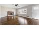 Living room featuring hardwood floors and a brick fireplace at 2515 Rutgers Rd, Indianapolis, IN 46227