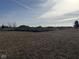 Empty lot with piles of dirt and a silt fence at 2974 S Kings Way, New Palestine, IN 46163