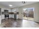 Bright kitchen with stainless steel appliances and access to backyard at 5443 Drum Rd, Indianapolis, IN 46216