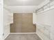 Walk-in closet with wire shelving and neutral carpeting at 6337 Cardinal Ln, Indianapolis, IN 46220