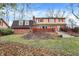 Two story brick home with attached garage and landscaping at 6337 Cardinal Ln, Indianapolis, IN 46220